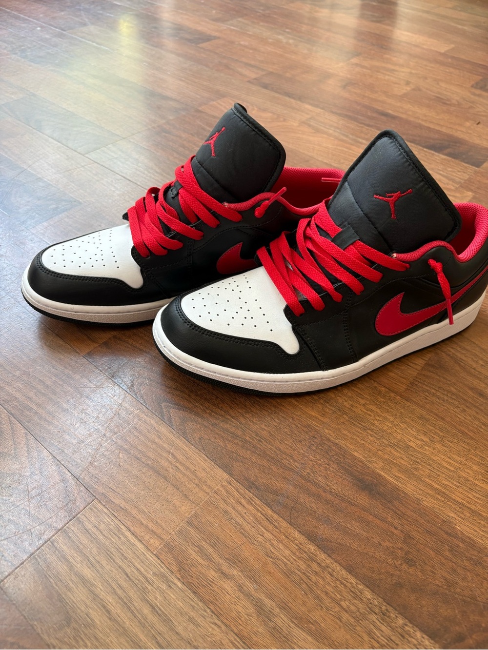 Nike Air Jordan 1 Low Top White Toe Sneakers in Black, White & Red